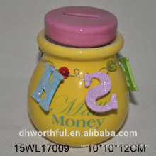 Beautiful ceramic piggy bank in bright colors